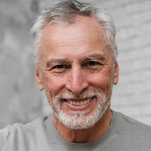 Portrait of a smiling verified buyer representing healthy longevity, vitality, and daily nerve comfort recovery.